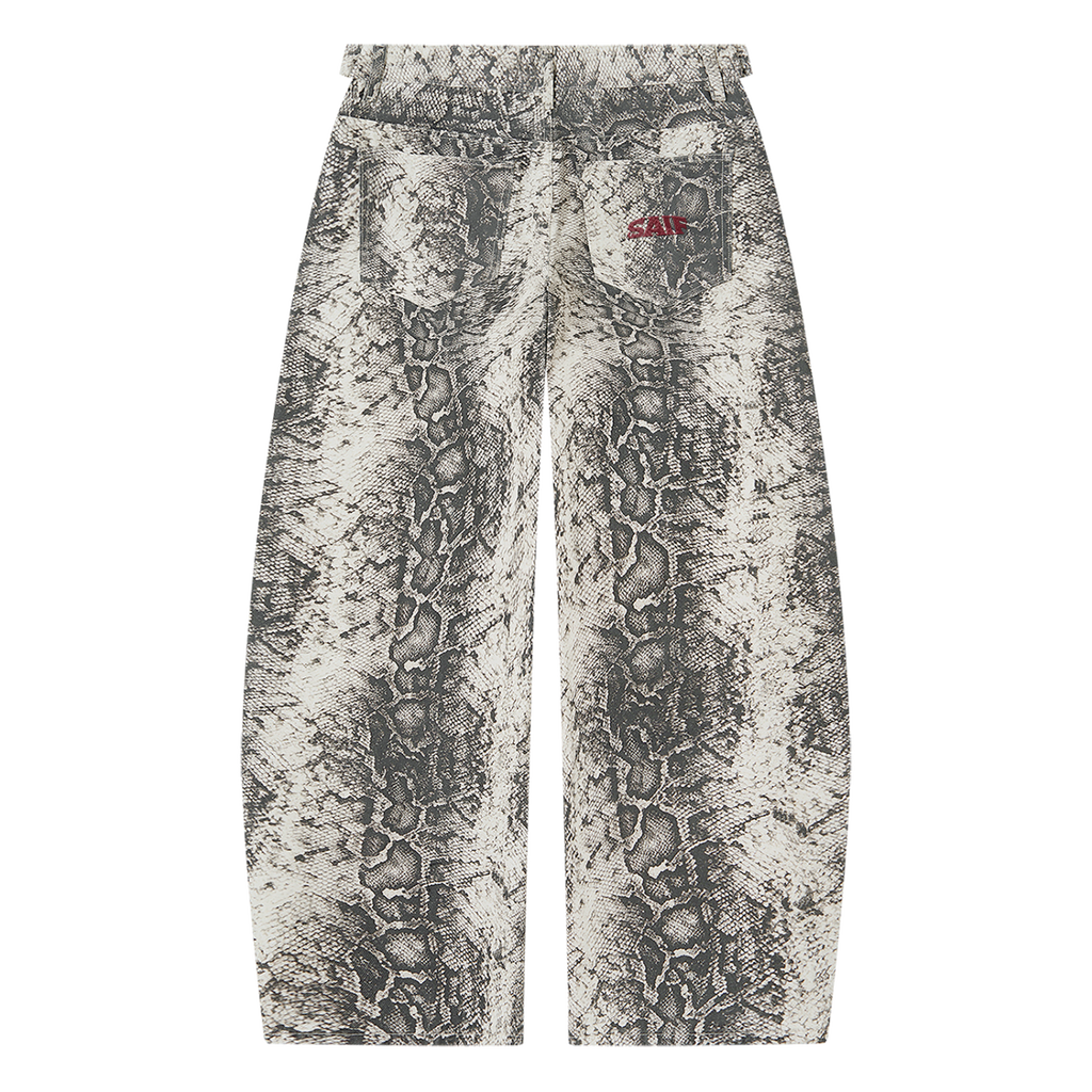 The Python Pants in monochrome snake print with oxblood Saif logo, back view