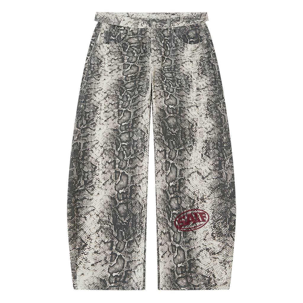 The Python Pants in monochrome snake print with oxblood Saif logo, front view